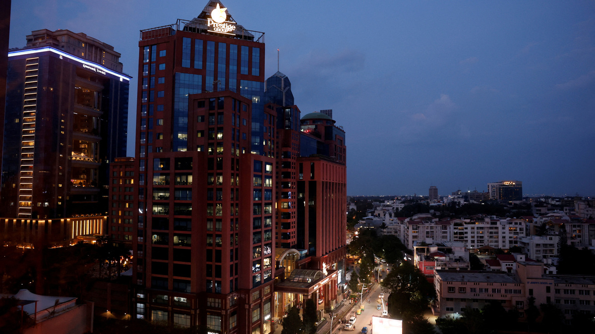 A city skyline with apartment blocks and office buildings, in Bengaluru, India, May 10, 2026. REUTERS/Priyanshu Singh