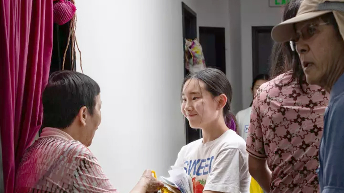 Chinatown elders need groceries. These teens go door-to-door delivering them