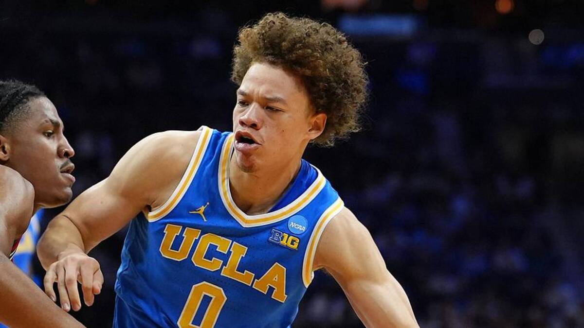  Mar 22, 2026; Philadelphia, PA, USA; UCLA Bruins guard Trent Perry (0) dribbles the ball against the UConn Huskies in the first half during a second round game of the men's 2026 NCAA Tournament at Xfinity Mobile Arena. Mandatory Credit: Kyle Ross-Imagn Images | Kyle Ross-Imagn Images 