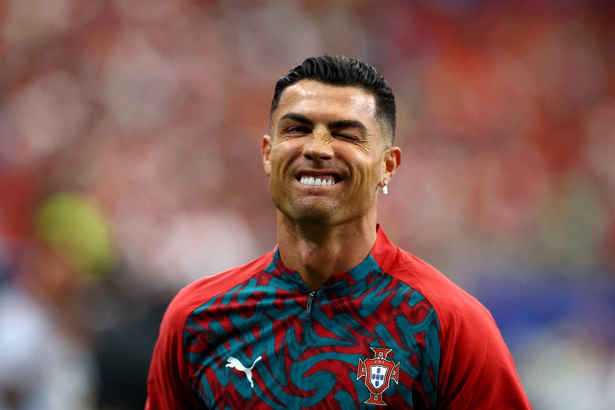  Portugal's Cristiano Ronaldo winks during the warm up REUTERS - Phil Noble