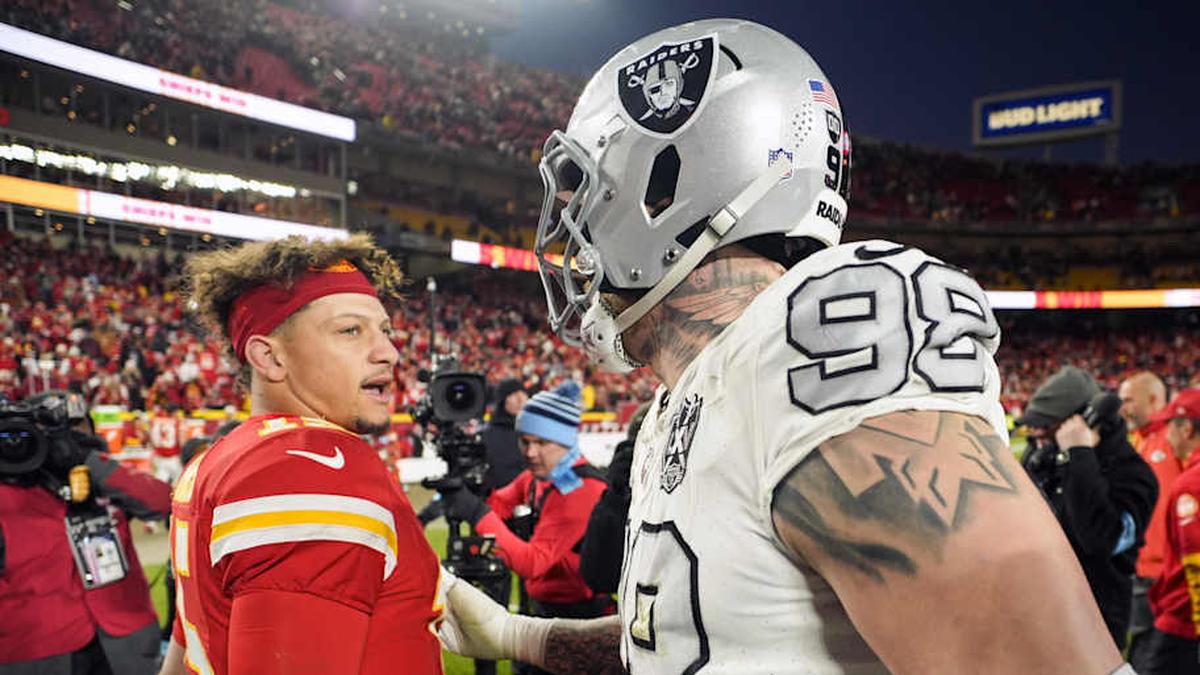  Nov 29, 2024; Kansas City, Missouri, USA; Kansas City Chiefs quarterback Patrick Mahomes (15) talks with Las Vegas Raiders defensive end Maxx Crosby (98) after a game at GEHA Field at Arrowhead Stadium. Mandatory Credit: Jay Biggerstaff-Imagn Images | Jay Biggerstaff-Imagn Images 