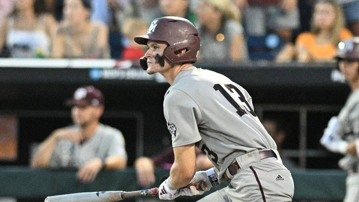  Jun 24, 2024; Omaha, NE, USA; Texas A&M Aggies left fielder Caden Sorrell (13) doubles in a run against the Tennessee Volunteers during the eighth inning at Charles Schwab Field Omaha. | Steven Branscombe-Imagn Images 