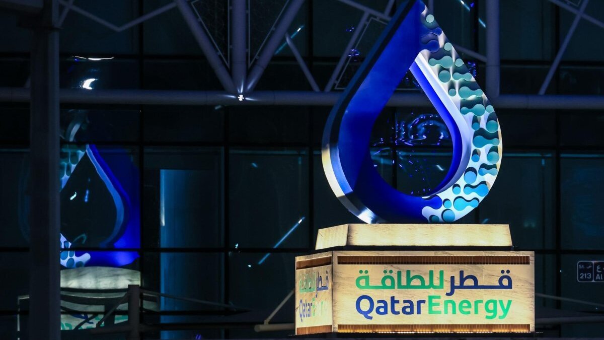 The logo of state-owned petroleum company QatarEnergy is shown in front of its headquarters in Doha, Qatar. An explosion at a liquefied natural gas plant in Qatar killed 13 and injured dozens Sunday. Photo by Hannibal Hanschke/EPA