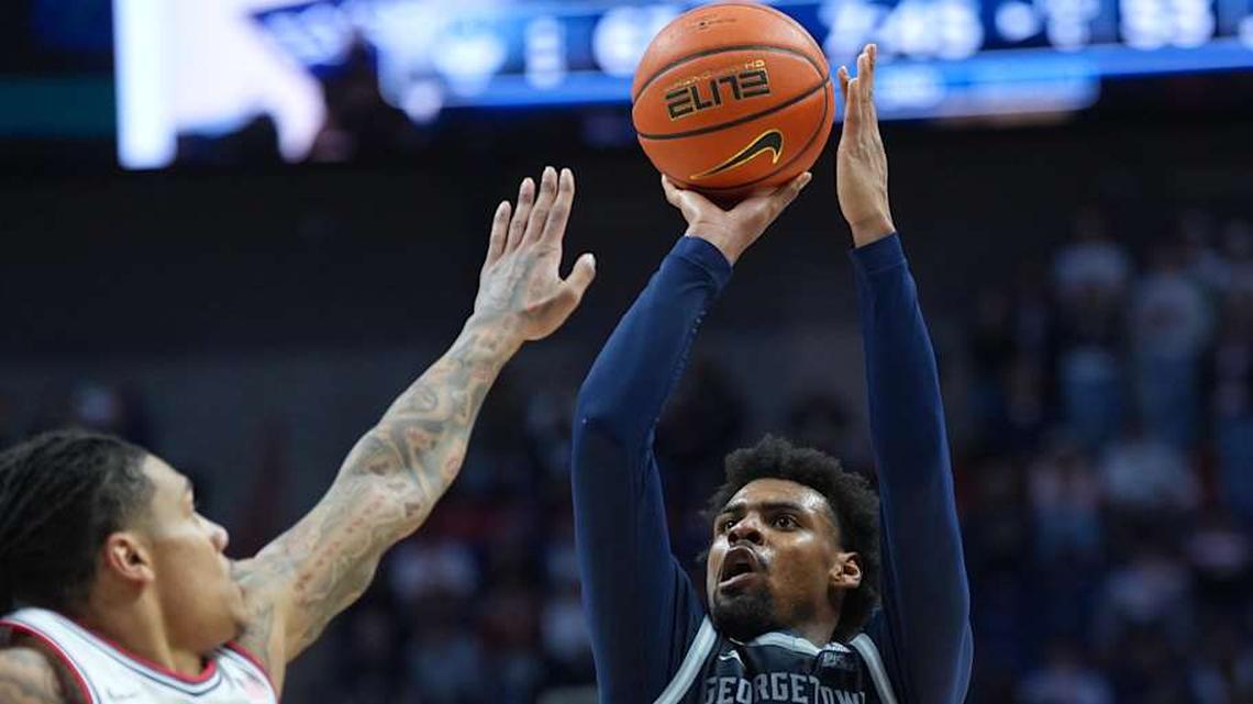  Feb 14, 2026; Storrs, Connecticut, USA; Georgetown Hoyas guard KJ Lewis (5) shoots the ball against UConn Huskies guard Solo Ball (1) in the second half at Harry A. Gampel Pavilion. Mandatory Credit: David Butler II-Imagn Images | David Butler II-Imagn Images 