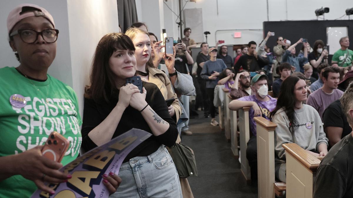 Attendees listen to U.S. Rep. Alexandria Ocasio-Cortez during a rally in support of Chris Rabb's progressive campaign for Pennsylvania's 3rd Congressional District, at the Garden of Prayer church on May 15, 2026, in Philadelphia. (Elizabeth Robertson/The Philadelphia Inquirer/TNS)