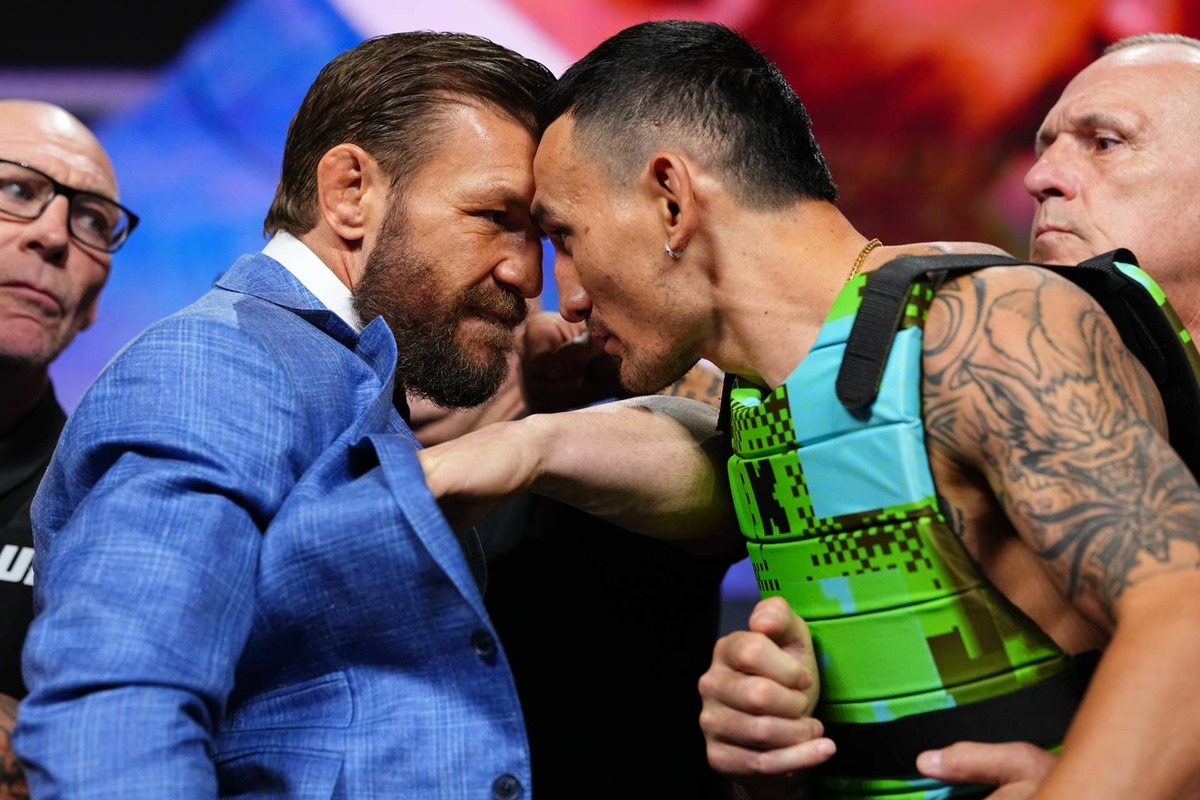  (L-R) Conor McGregor and Max Holloway face off during the UFC 329 press conference at T-Mobile Arena. Chris Unger/Zuffa LLC via Getty Images