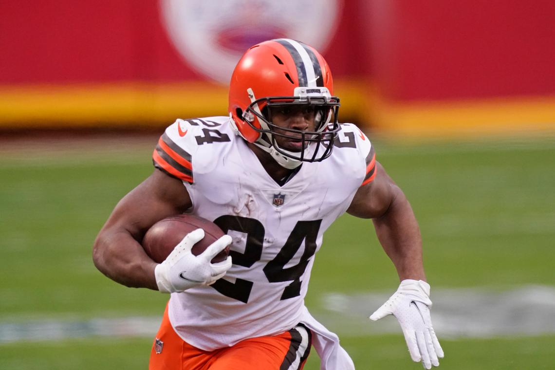 Cleveland Browns running back Nick Chubb carries the ball up field during the second half of an NFL divisional round football game against the Kansas City Chiefs on Jan. 17, 2021, in Kansas City.