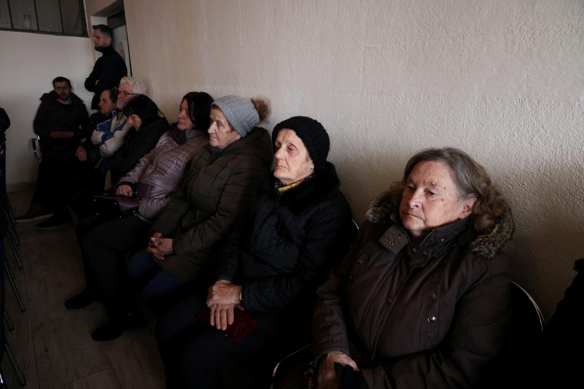 Concerned residents of the village of Przici attend a meeting where the harmful effects of lead in the body are demonstrated, in Vares, Bosnia and Herzegovina, February 21, 2026. Recent tests have detected lead in the blood of more than 300 nearby residents, fueling fear and uncertainty about the future of the town. REUTERS/Amel Emric