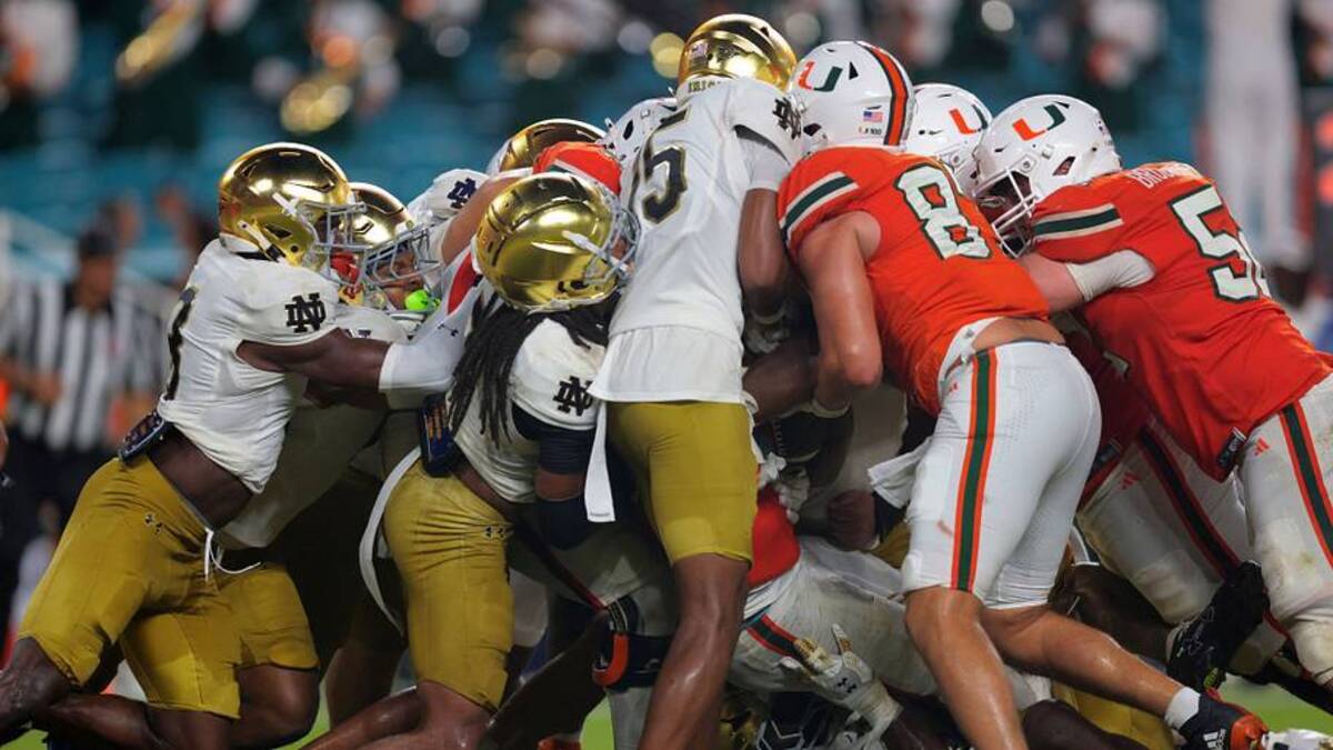  Aug 31, 2025; Miami Gardens, Florida, USA; Miami Hurricanes running back CharMar Brown (6) scores a touchdown against the Notre Dame Fighting Irish during the third quarter at Hard Rock Stadium. Mandatory Credit: Sam Navarro-Imagn Images | IMAGN IMAGES via Reuters Connect 