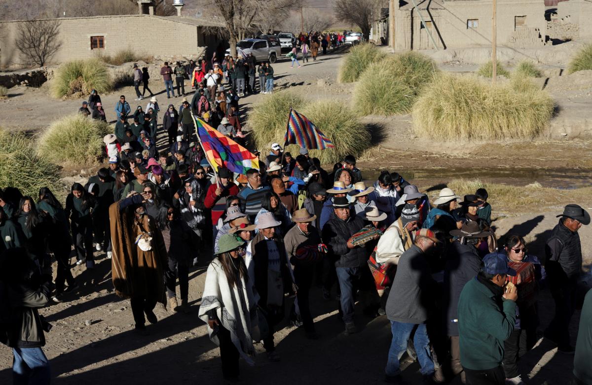 People participate in a ceremony following the return of the so-called “Child of Chani,” an Inca-era child mummy found frozen in 1905 at nearly 5,900 meters on a mountain, after being returned to a local indigenous community following about 120 years in a Buenos Aires museum, El Moreno, in Jujuy province, Argentina May 28, 2026. REUTERS/Gianni Bulacio