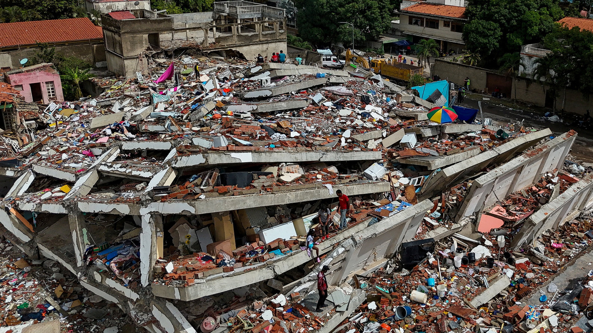 Aerial view of collapsed buildings in Caraballeda, La Guaira state, Venezuela, on June 30, 2026, following earthquakes. MIGUEL MEDINA/Pool via REUTERS