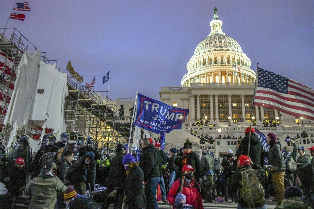 FILE -- Supporters of President Donald Trump approach the Capitol in Washington, Jan. 6, 2021. President Donald Trump has made clear that he believes the Jan. 6 rioters should not only be praised, but that they should be compensated with taxpayer money. (Kenny Holston/The New York Times)