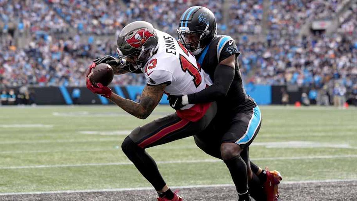  Dec 21, 2025; Charlotte, North Carolina, USA; Tampa Bay Buccaneers wide receiver Mike Evans (13) catches a touchdown against Carolina Panthers cornerback Mike Jackson (2) during the first half at Bank of America Stadium. Mandatory Credit: Jim Dedmon-Imagn Images | Jim Dedmon-Imagn Images 