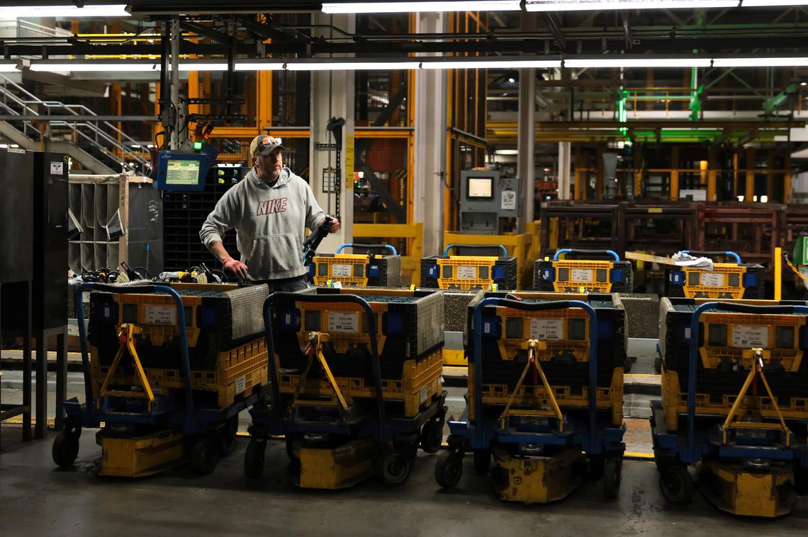  File: A worker helps assemble automobiles at Ford River Rouge Complex on January 13, 2026, in Dearborn, Michigan. 
