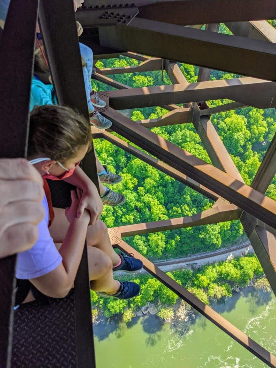  Teens can sit on the New River Gorge Bridge catwalk and dangle their feet as they look down 851 feet to the New River below. Photo credit: Cindy Richards 