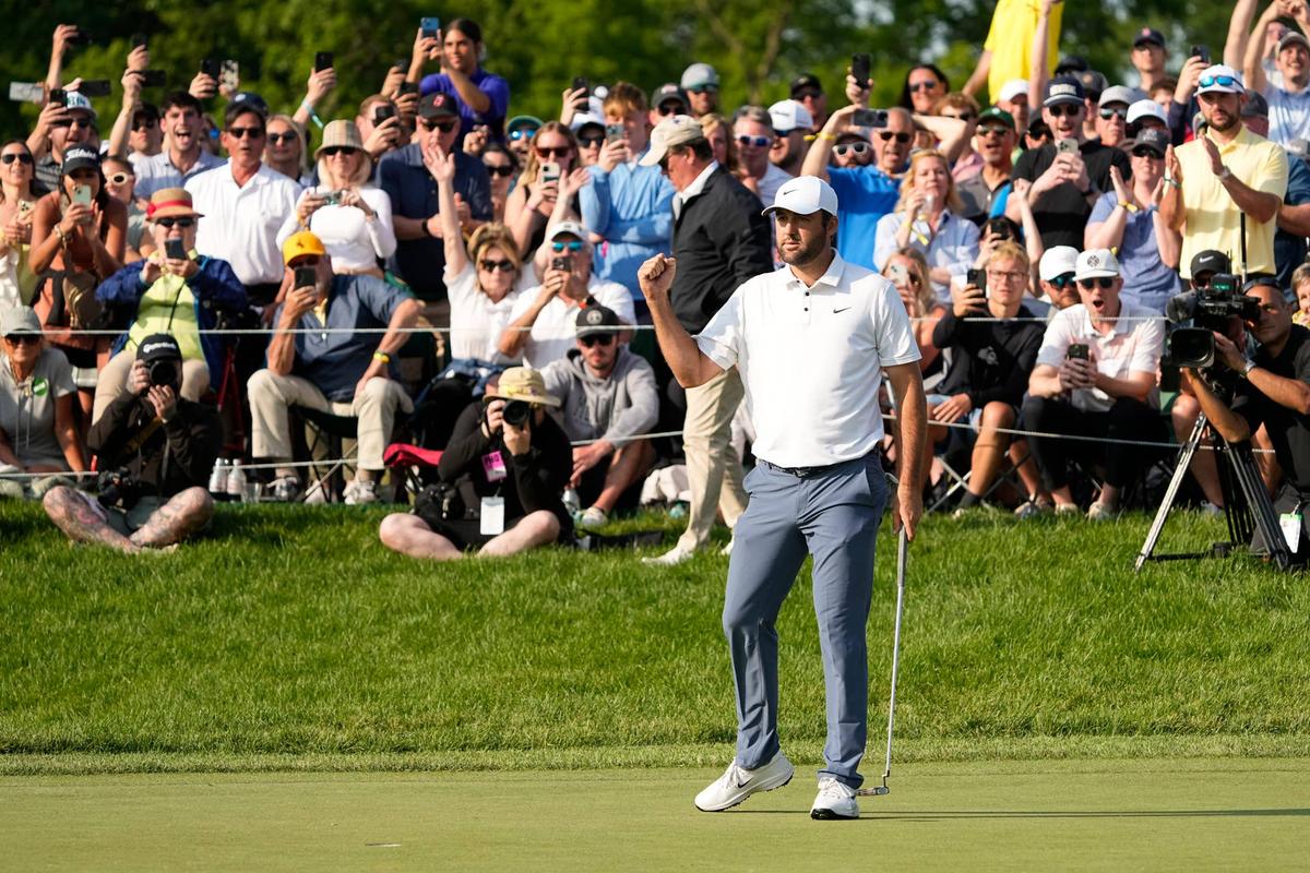  Scottie Scheffler celebrates on the 18th green after winning the Memorial Tournament at Muirfield Village Golf Club in Dublin, Ohio, on June 1, 2025. USA TODAY Network via Reuters Connect