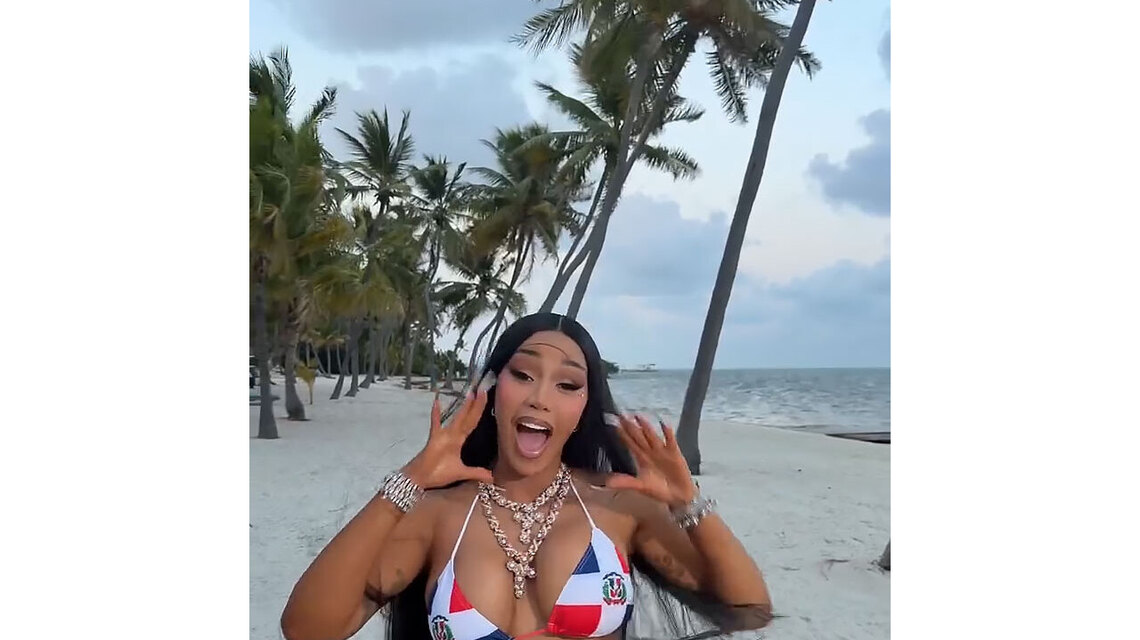 Cardi B Flaunts Curves in a String Bikini While Teasing Lyrics to New Song 