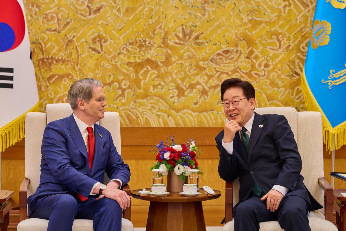 South Korean President Lee Jae Myung talks with U.S. Treasury Secretary Scott Bessent during their meeting at the Presidential Blue House in Seoul, South Korea, May 13, 2026.    The Presidential Blue House/Yonhap via REUTERS