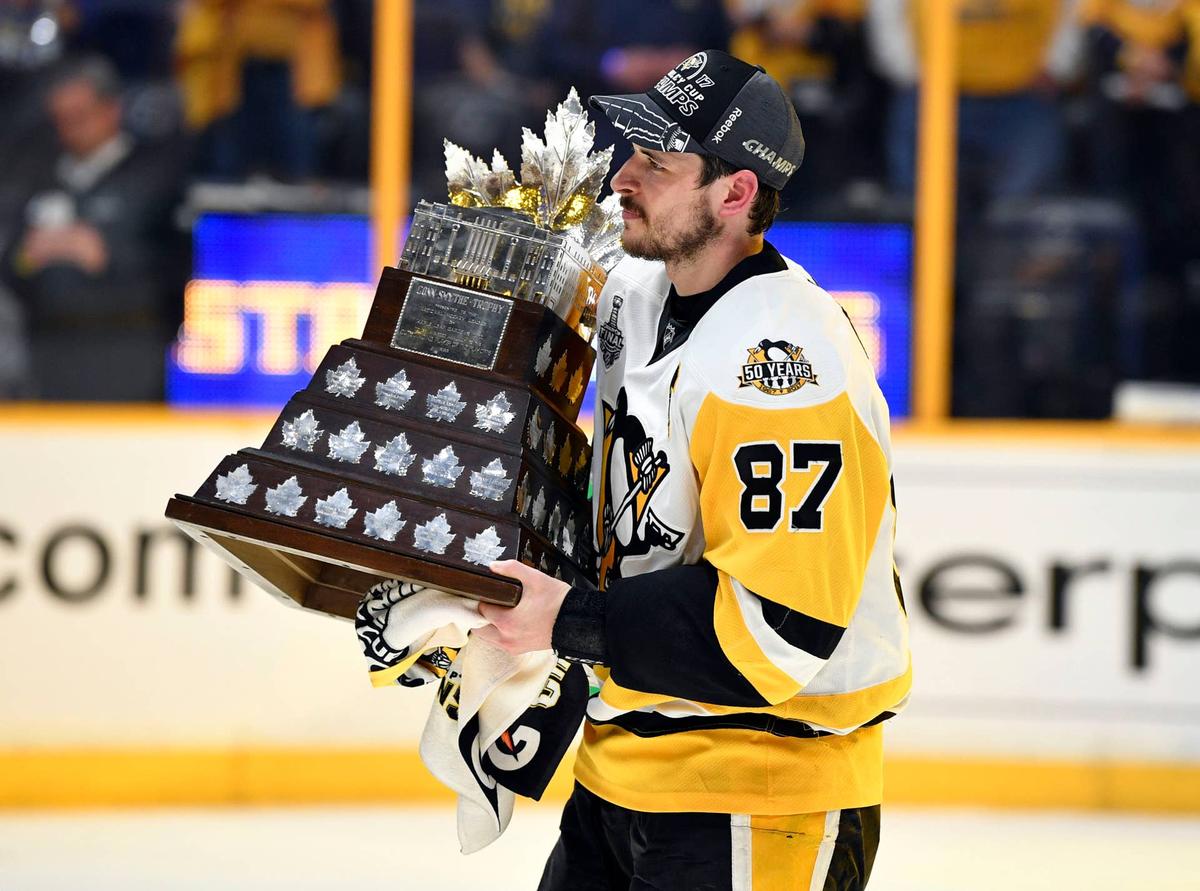  Pittsburgh Penguins center Sidney Crosby is presented with the Conn Smythe Trophy after defeating the Nashville Predators in the 2017 Stanley Cup Final. Christopher Hanewinckel-USA TODAY Sports via Imagn Images