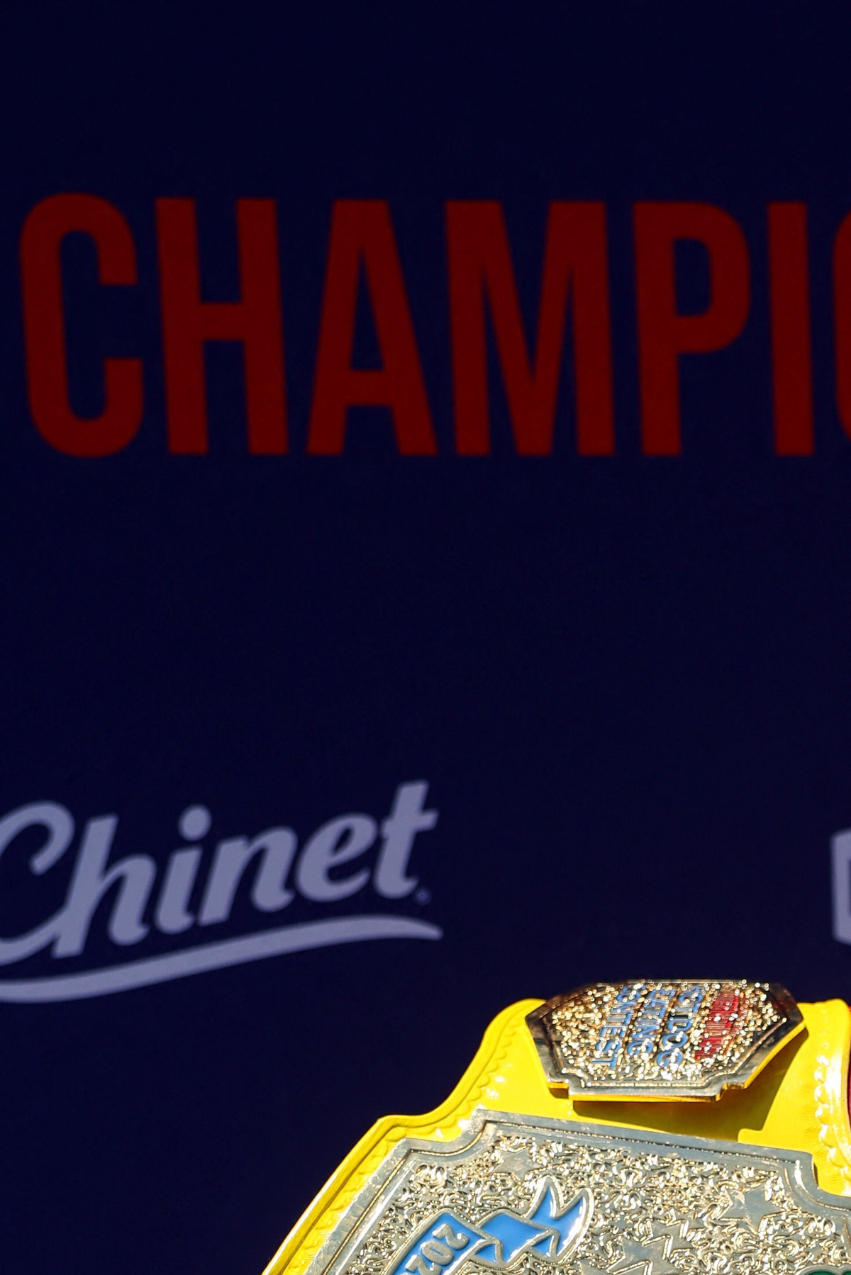 Joey Chestnut poses with a belt after winning the men's division in the 2026 Nathan's Famous International Hot Dog Eating Contest, at Coney Island, Brooklyn in New York City, U.S., July 4, 2026. REUTERS/Jordan Tovin