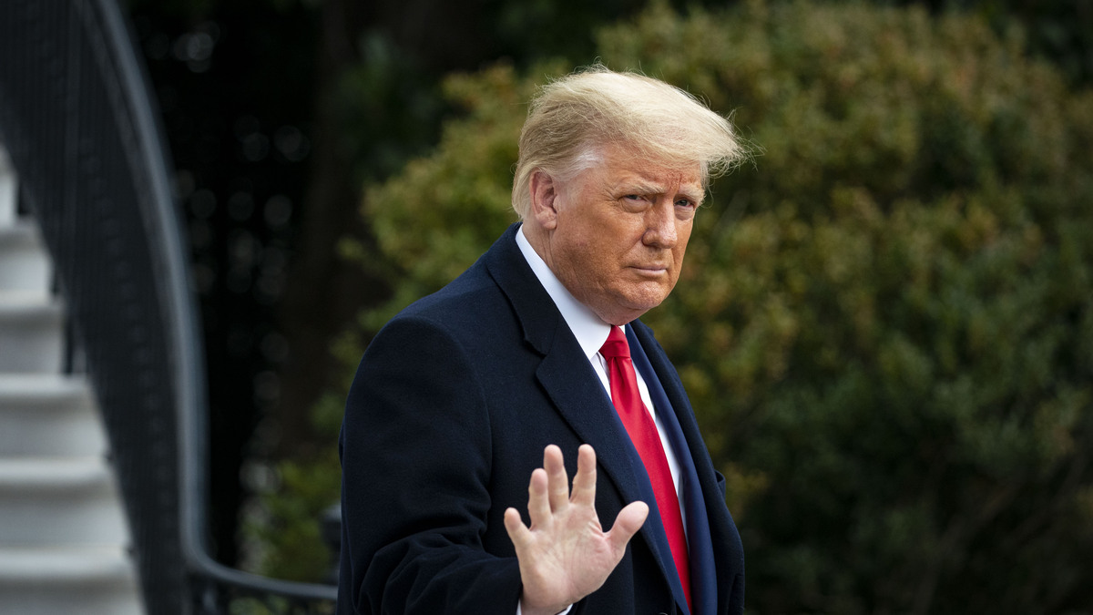 President Donald Trump waves as he departs on the South Lawn of the White House, on December 12, 2020, in Washington, D.C. Trump pardoned six people who he said were sentenced or in prison for “fixing their car,” a day before the U.S. celebrates 250 years of independence on July 4, 2026.(Al Drago/Getty Images/TNS)