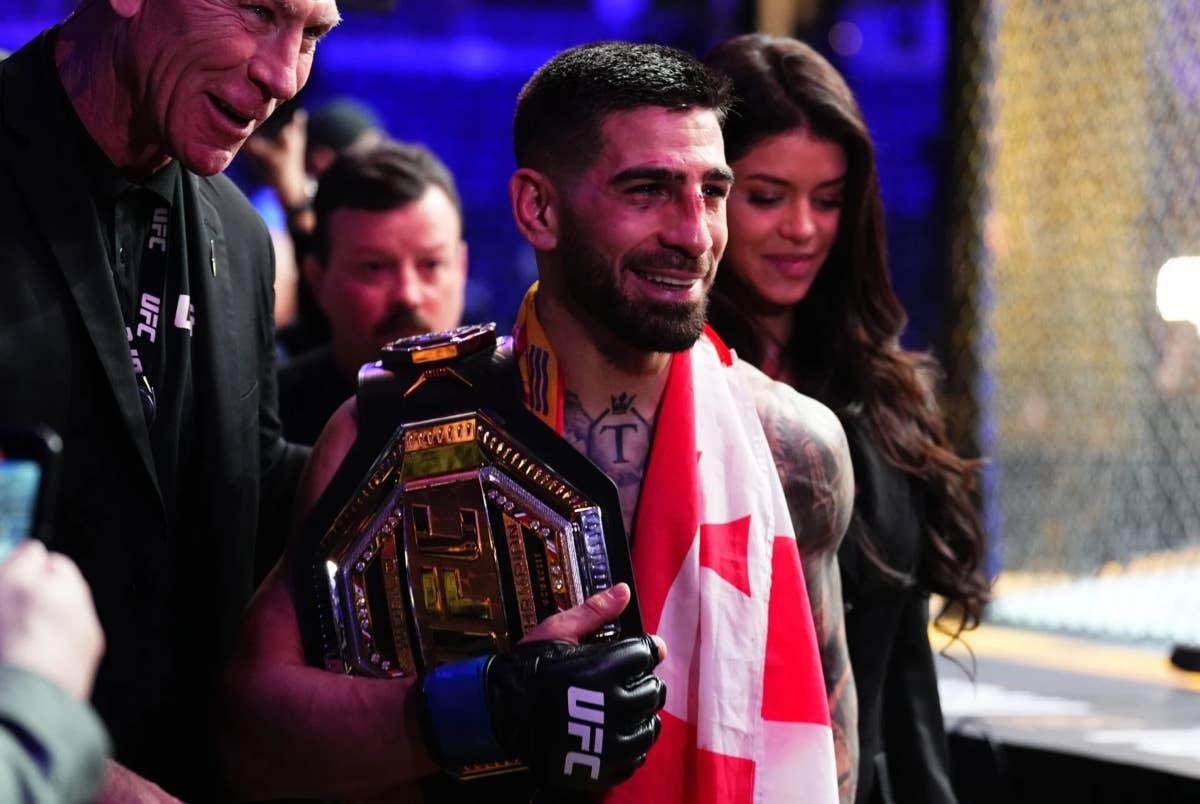  Ilia Topuria leaves the Octagon after capturing his first UFC title. (via Zuffa LLC)