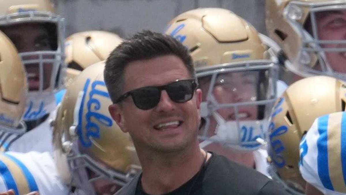  May 2, 2026; Pasadena, CA, USA; UCLA Bruins coach Bob Chesney and women's basketball coach Cori Close lead players onto the field during the spring game at Rose Bowl. Mandatory Credit: Kirby Lee-Imagn Images | Kirby Lee-Imagn Images 