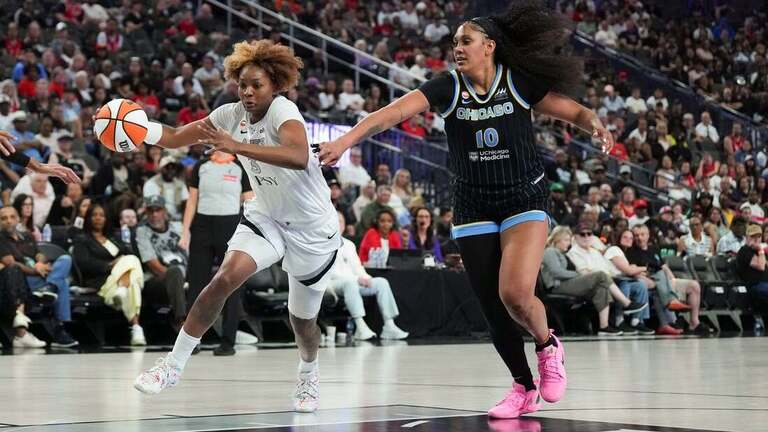Without A'ja Wilson, Aces survive Sky in OT 