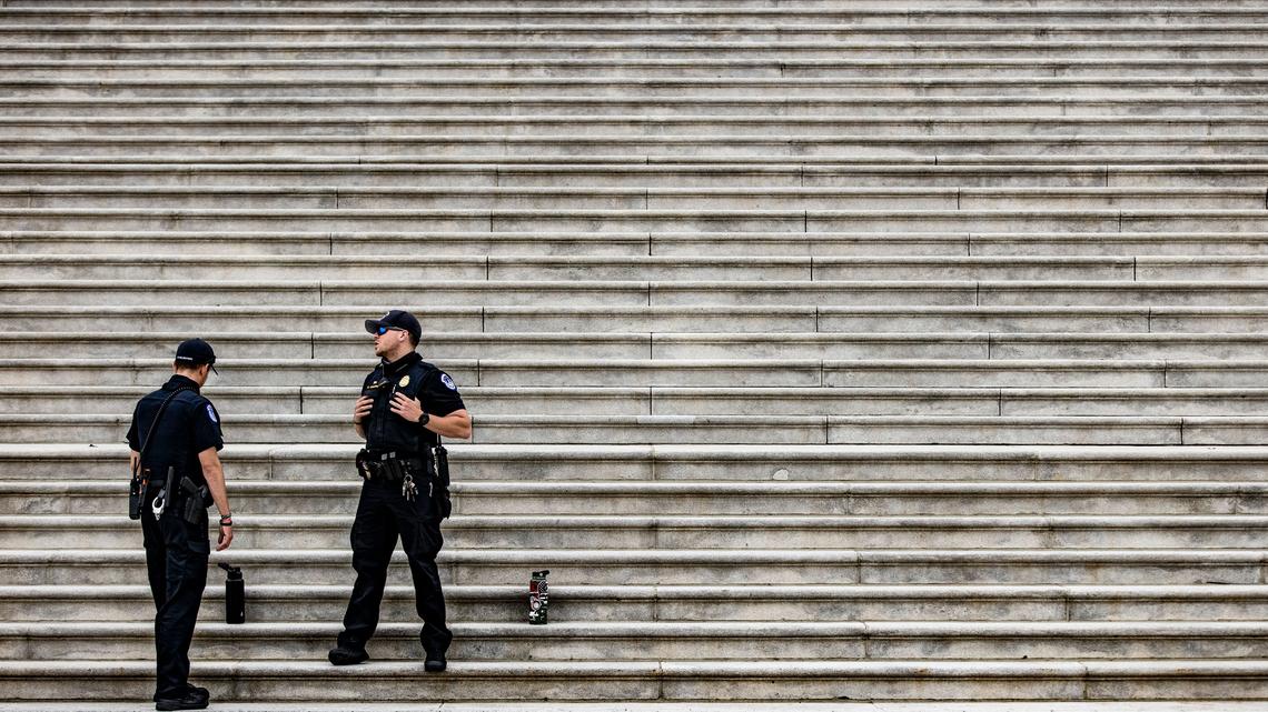 Capitol Police officers stand at the bottom of the steps to the Rotunda at the U.S. Capitol building on Capitol Hill in Washington, D.C. on April 29, 2021. (Samuel Corum/AFP/Getty Images/TNS)