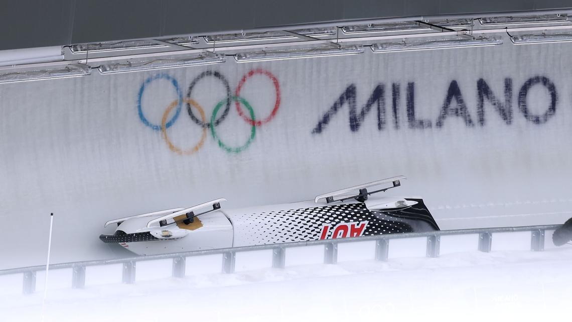 Olympian Hospitalized After 1,500 Lbs Bobsled Overturns During Olympics Race 