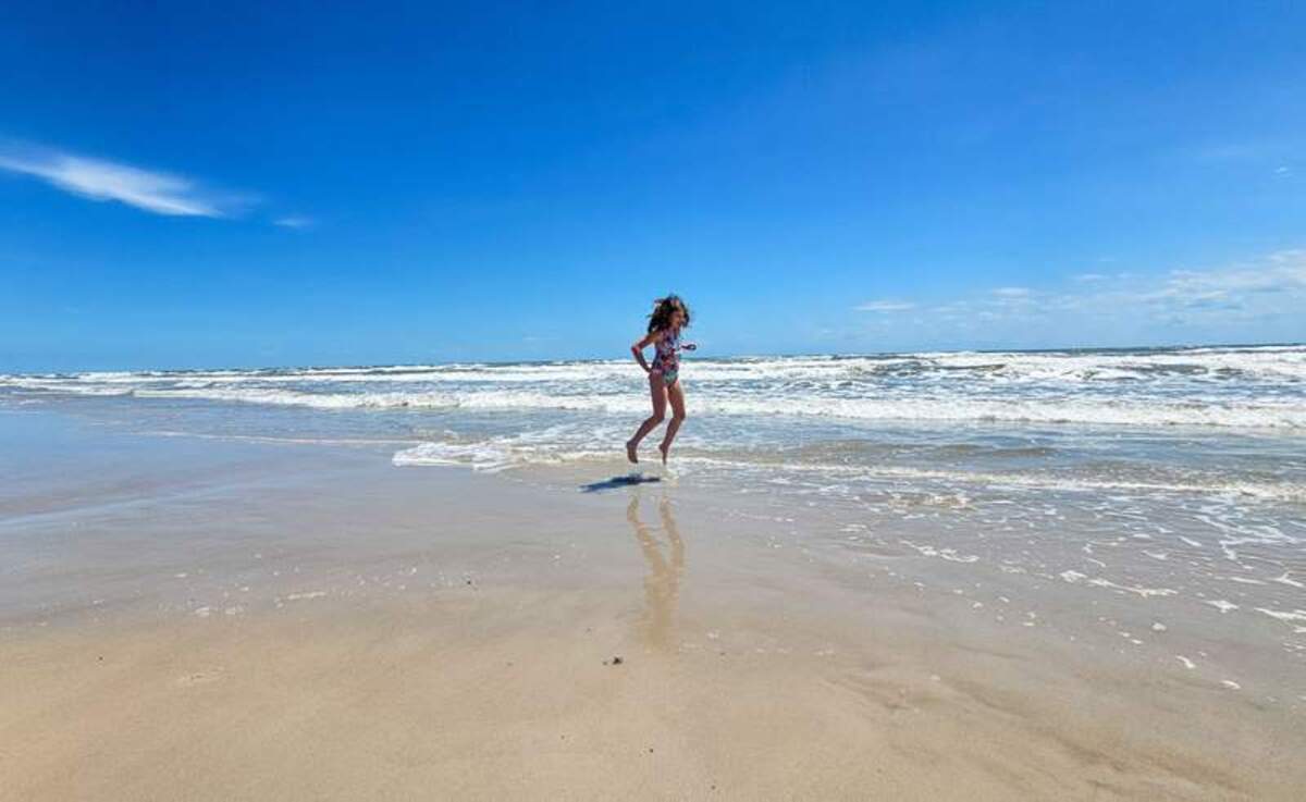  My daughter dancing and playing in the waves Photo credit: Phylicia Stitzel 