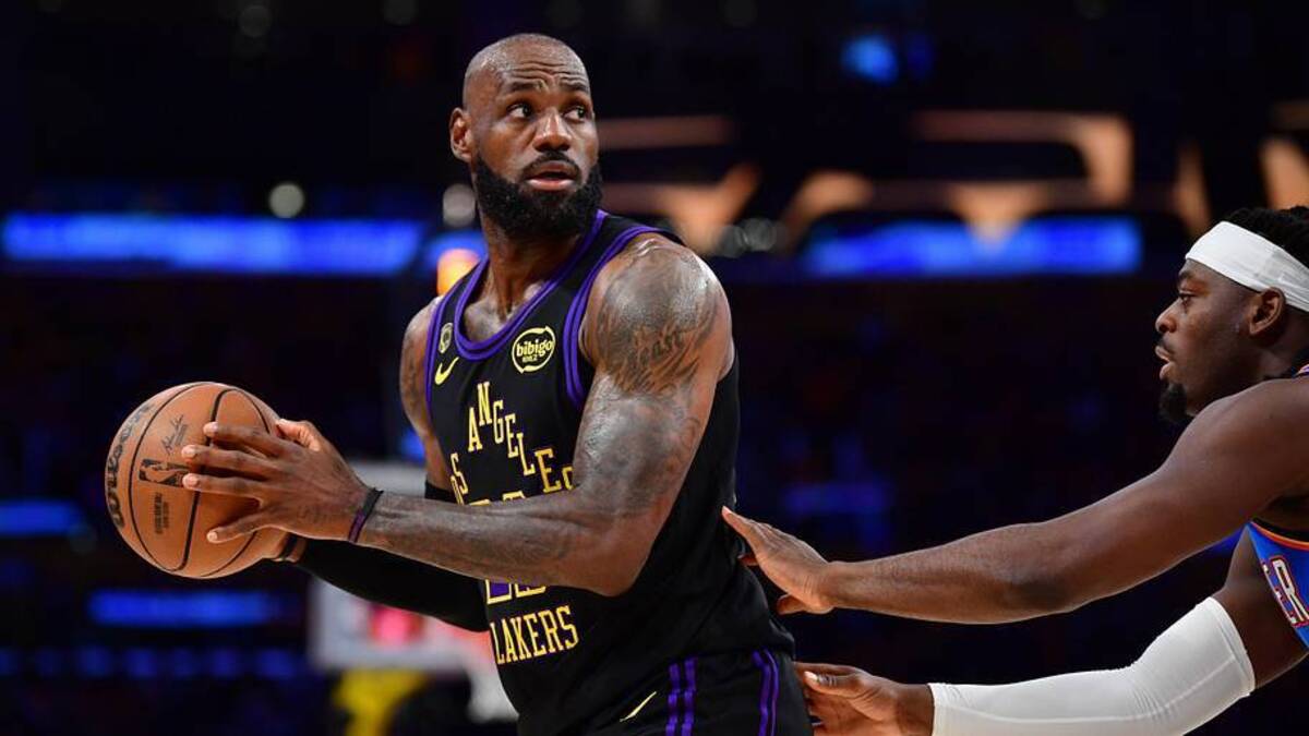  May 11, 2026; Los Angeles, California, USA; Los Angeles Lakers forward LeBron James (23) controls the ball against Oklahoma City Thunder guard Luguentz Dort (5) during the first half in game four of the second round of the 2026 NBA Playoffs at Crypto.com Arena. Mandatory Credit: Gary A. Vasquez-Imagn Images | Gary A. Vasquez-Imagn Images 