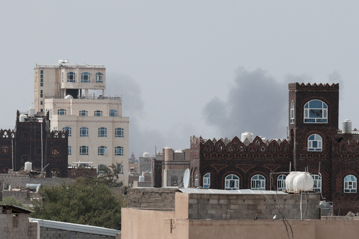 Smoke rises after reports of an airstrike hitting near the Sanaa International Airport, as seen from Sanaa, Yemen, July 13, 2026. REUTERS/Khaled Abdullah