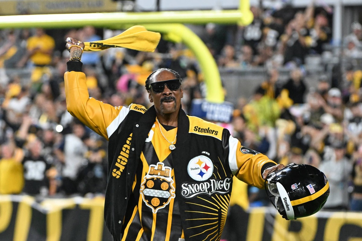  Snoop Dogg waves the Terrible Towel before the game against the Dallas Cowboys at Acrisure Stadium. Barry Reeger-Imagn Images