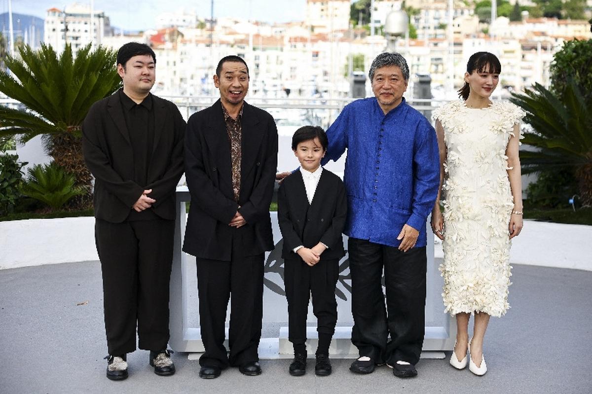 Director Hirokazu Kore-eda, cast members Haruka Ayase, Daigo Yamamoto, Rimu Kuwaki, and composer Yuta Bandoh pose during a photocall for the film  "Sheep in the Box" in competition at the 79th Cannes Film Festival in Cannes, France, May 17, 2026. REUTERS/Sarah Meyssonnier