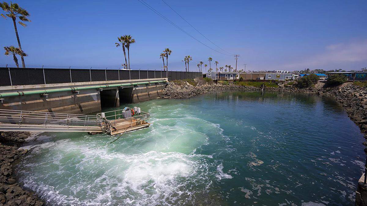 Brine water exiting from Carlsbad (California) Desalination Plant is further mixed with ocean water at the discharge pond before exiting out toward the ocean jetty. San Diego could sell some of its rights to Colorado River water to Arizona and Nevada under a deal struck Wednesday that could help parched inland states fill a widening gap between water supply and demand.