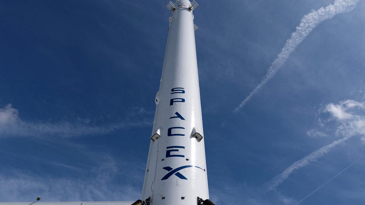 FILE PHOTO: The SpaceX Falcon 9 rocket booster is shown outside the company?s facility in Hawthorne California, U.S., April 23, 2026. REUTERS/Mike Blake/File Photo