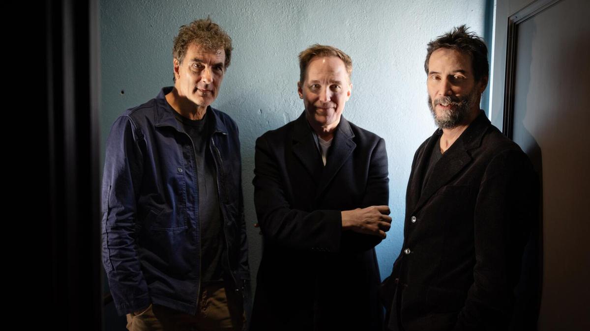 Pasadena, CA - February 19: Dogstar, is an American alternative rock band, consisting of (From Left) drummer Robert Mailhouse, guitarist/lead vocalist Bret Domrose and bassist Keanu Reeves pose for a portrait on Thursday, Feb. 19, 2026 in Pasadena, CA. (Jason Armond / Los Angeles Times)
