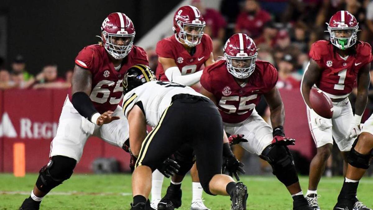  Sep 24, 2022; Tuscaloosa, Alabama, USA; Alabama Crimson Tide offensive lineman JC Latham (65) and offensive lineman Emil Ekiyor Jr. (55) move to pass block against the Vanderbilt Commodores at Bryant-Denny Stadium. Alabama won 55-3. Mandatory Credit: Gary Cosby Jr.-USA TODAY Sports | USA TODAY Sports 