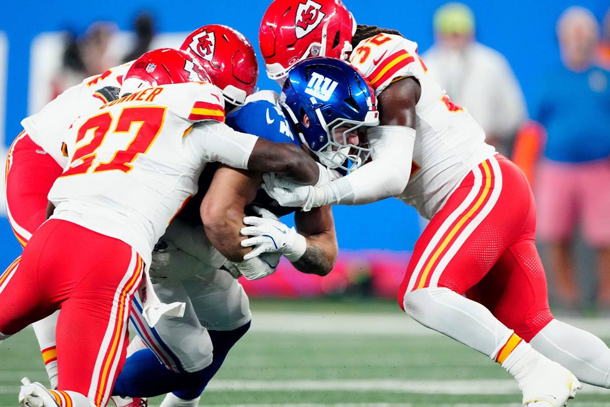  A trio of Kansas City Chiefs tries to take down New York Giants running back Cam Skattebo (44) Kevin R. Wexler-NorthJersey.com / USA TODAY NETWORK via Imagn Images