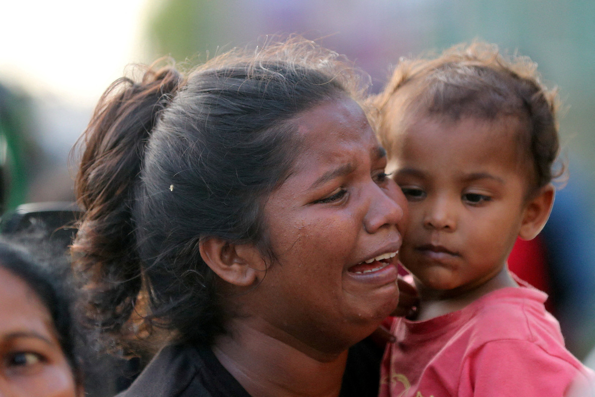 A woman wails outside a hospital seeking information about her brother, following clashes between two groups of inmates at Negombo Prison in the coastal town of Negombo, Sri Lanka, July 6, 2026. REUTERS/Lahiru Harshana