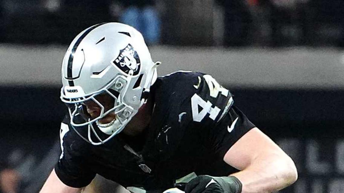  Jan 4, 2026; Paradise, Nevada, USA; Kansas City Chiefs quarterback Shane Buechele (17) is sacked by Las Vegas Raiders linebacker Devin White (45) and defensive end Malcolm Koonce (51) as linebacker Tommy Eichenberg (44) hurdles the play during the second quarter at Allegiant Stadium. Mandatory Credit: Stephen R. Sylvanie-Imagn Images | Stephen R. Sylvanie-Imagn Images 