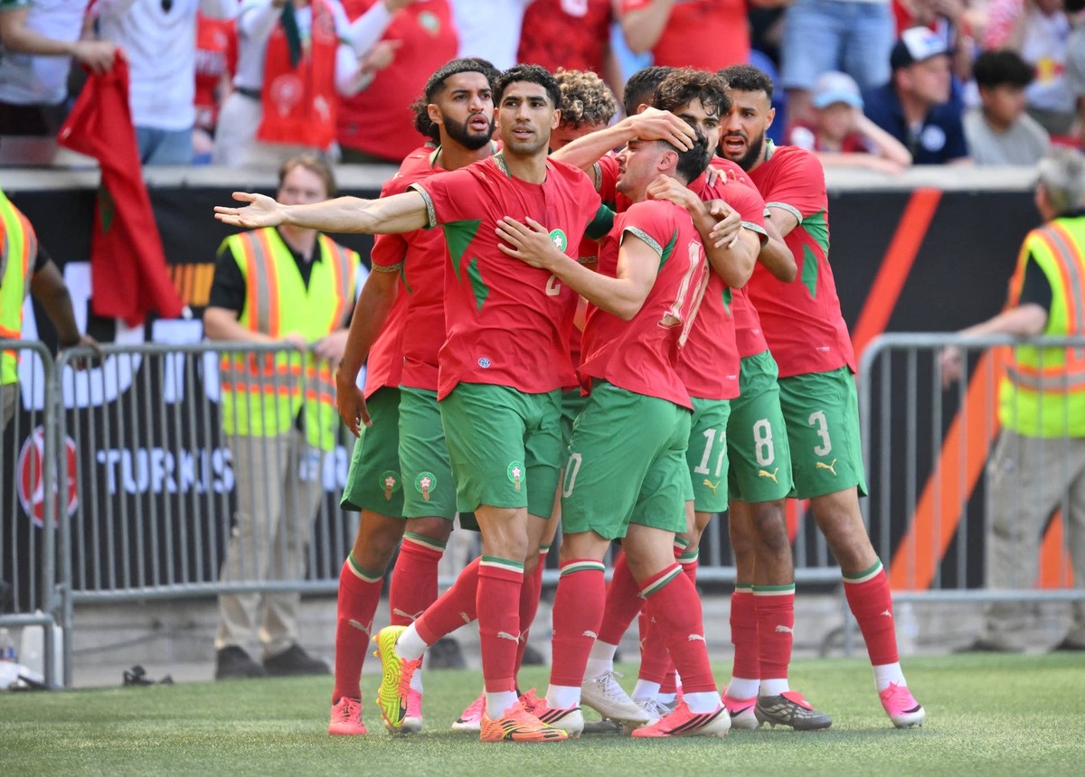  Morocco's defender #02 Achraf Hakimi (2nd L) celebrates with teammates after Morocco scored during the international friendly football match between Morocco and Norway at Sports Illustrated Stadium in Harrison, New Jersey, on June 7, 2026. (Photo by ANGELA WEISS / AFP via Getty Images) Photo by ANGELA WEISS / AFP via Getty Images