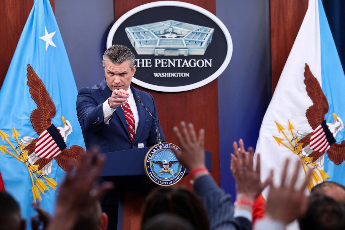 U.S. Secretary of Defense Pete Hegseth holds a briefing on the Iran war, with Chairman of the Joint Chiefs of Staff General Dan Caine (not pictured), at the Pentagon in Washington, D.C., U.S., May 5, 2026. REUTERS/Kevin Lamarque