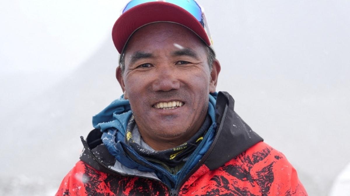 FILE PHOTO: Kami Rita Sherpa, 56, a Nepali mountaineer who has climbed Mount Everest 32 times and holds the record for reaching the summit of the world's highest mountain, smiles as he poses for a picture at Everest Base Camp  in the Solukhumbu district, also known as the Everest region, Nepal, April 29, 2026. REUTERS/Purnima Shrestha/File Photo