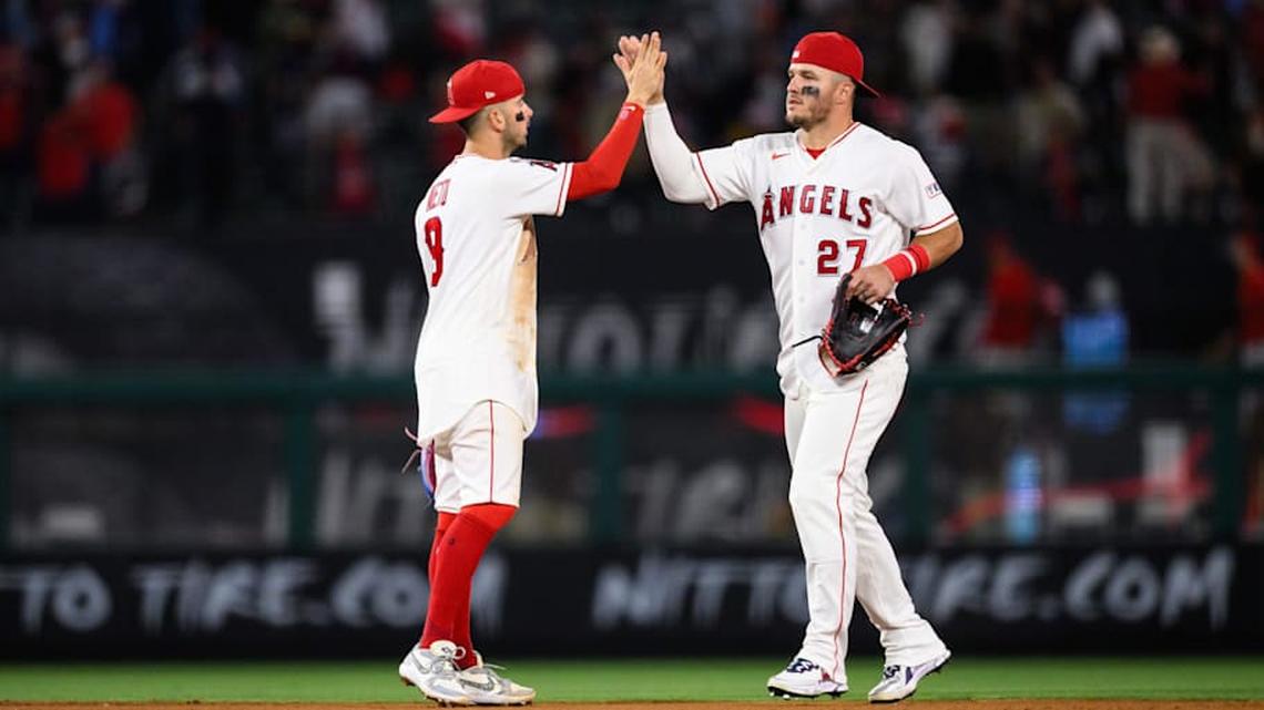  Apr 17, 2026; Anaheim, California, USA; Los Angeles Angels center fielder Mike Trout (27) greets shortstop Zach Neto (9) after defeating the San Diego Padres at Angel Stadium. | William Liang-Imagn Images 