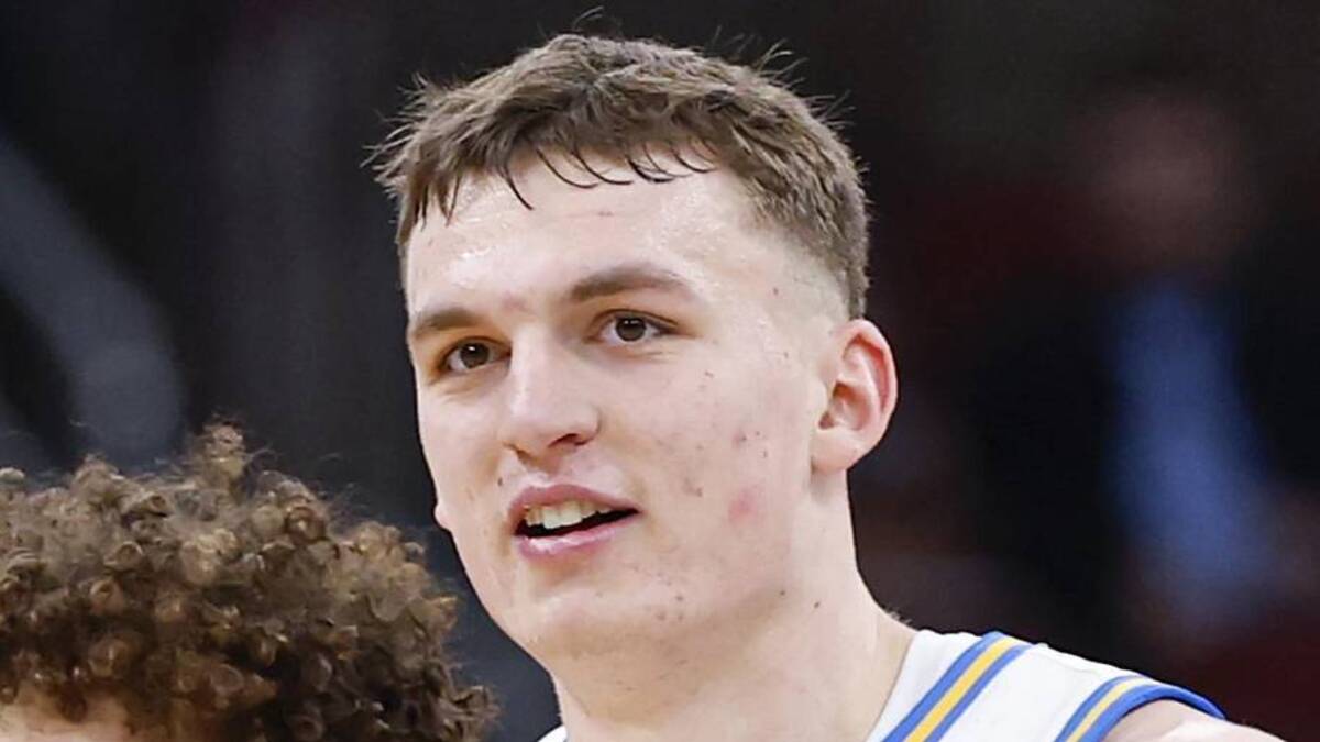 Mar 12, 2026; Chicago, IL, USA; UCLA Bruins guard Trent Perry (0) and forward Tyler Bilodeau (34) smile during the second half at United Center. Mandatory Credit: Kamil Krzaczynski-Imagn Images | Kamil Krzaczynski-Imagn Images 