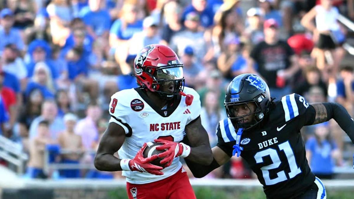  Sep 20, 2025; Durham, North Carolina, USA; North Carolina State Wolfpack wide receiver Terrell Anderson (9) runs the ball during the second quarter against Duke Blue Devils cornerback Landan Callahan (21) at Wallace Wade Stadium. Mandatory Credit: Zachary Taft-Imagn Images | Zachary Taft-Imagn Images 