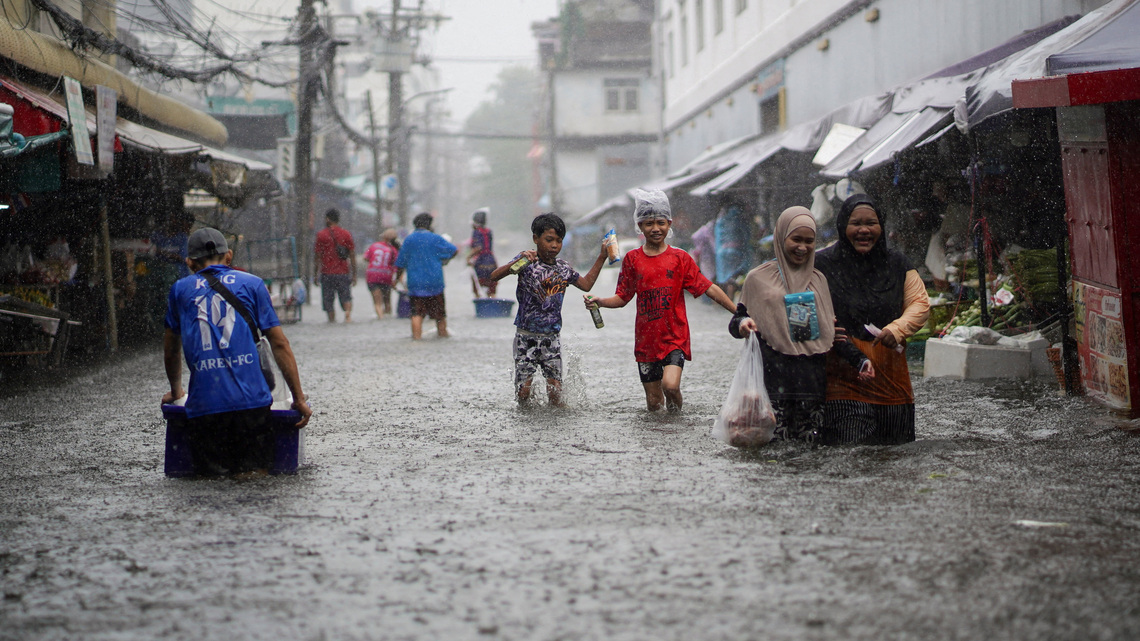 Thousands huddle in Bangkok shelters as Thai flood damages seen at over $320 million 