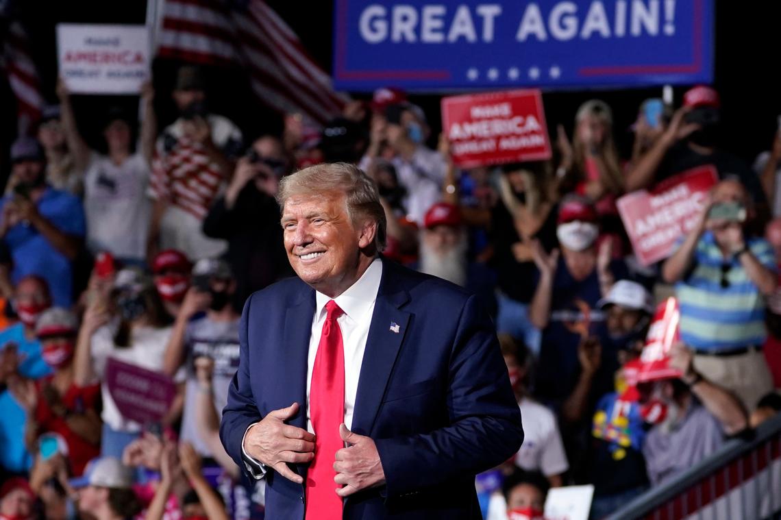 FILE - In this Sept. 8, 2020, file photo President Donald Trump stands on stage after speaking at a campaign rally at Smith Reynolds Airport in Winston-Salem, N.C. Senior aides described North Carolina as a “must-win” for the Republican president. (AP Photo/Evan Vucci, File)